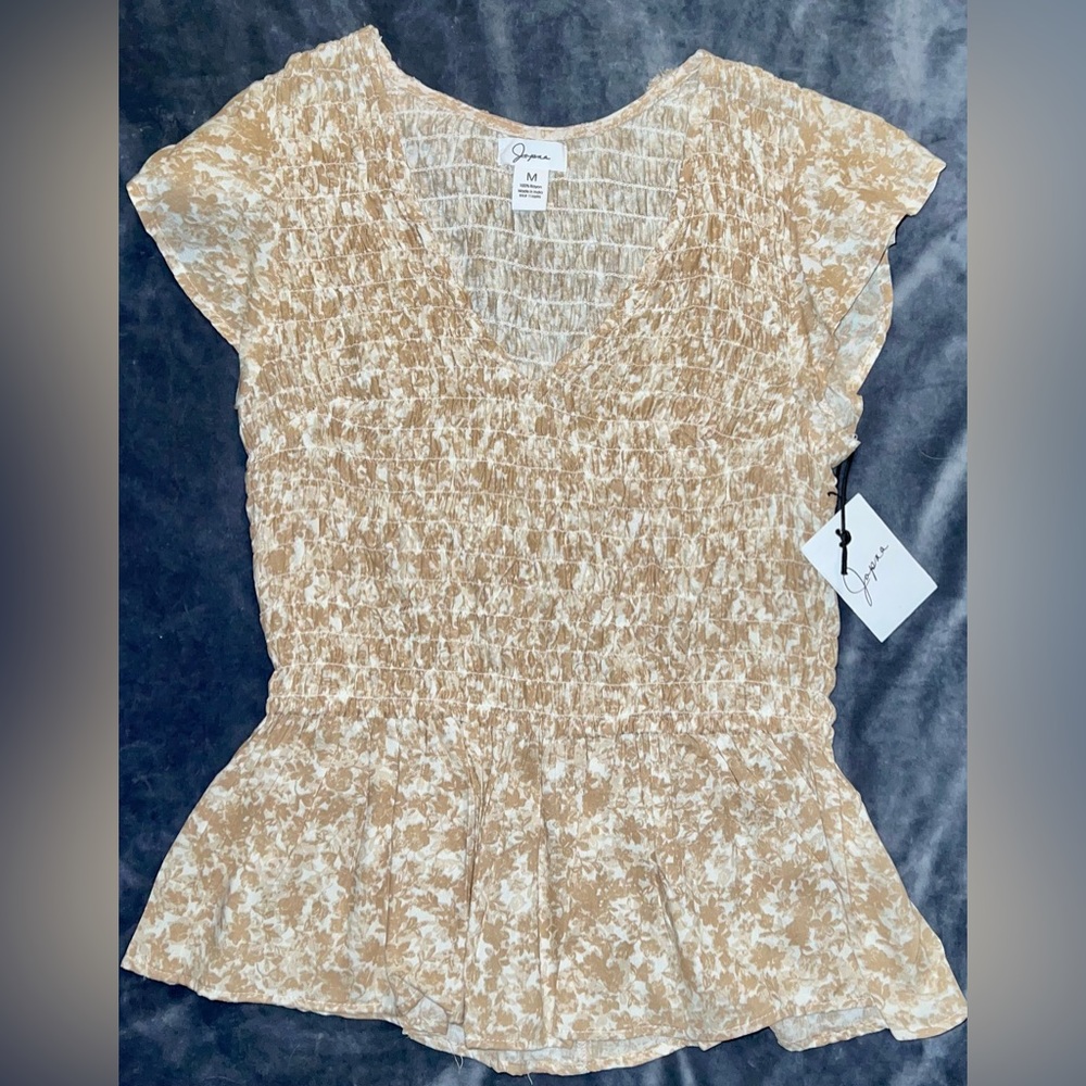 Fitted peplum style blouse